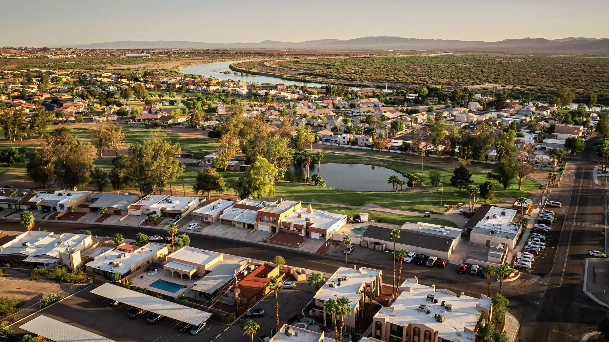 Aerial view of Bullhead City with the Colorado River flowing in the background
